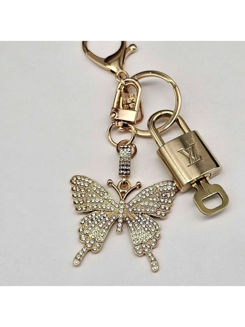Louis Vuitton Authentic Gold Lock 🔒 Unbranded Butterfly Keychain for Bags